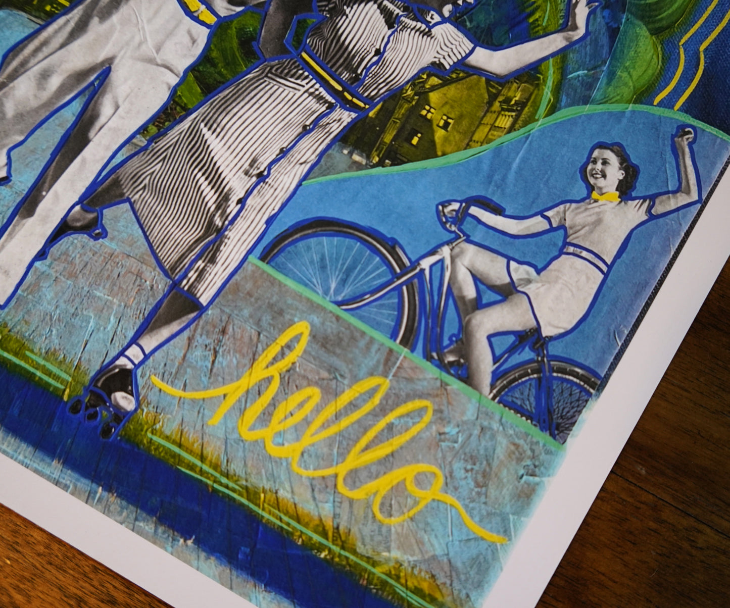 Artistic depiction of a person on a bicycle with 'hello' text in yellow.