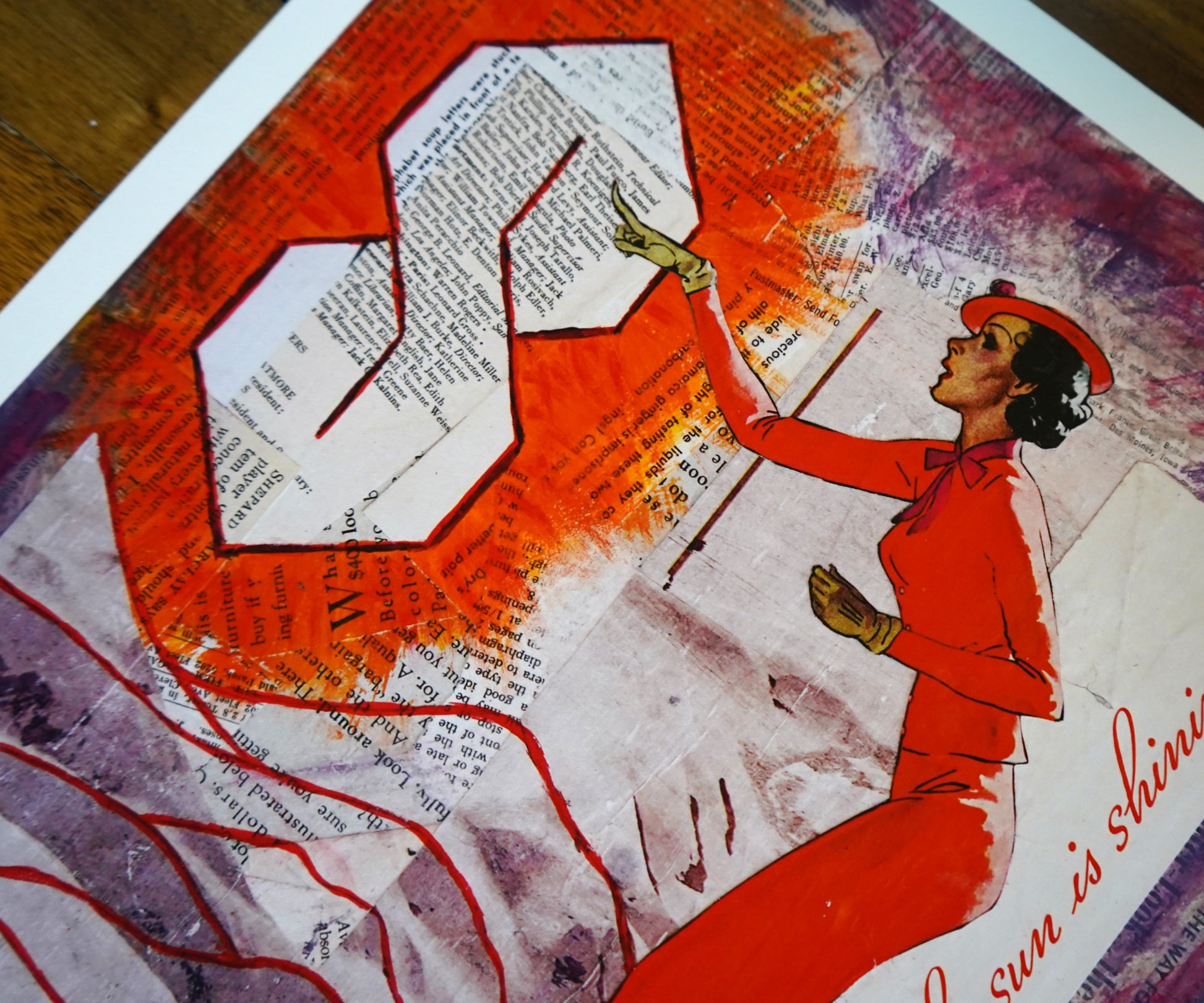 Artistic depiction of a woman in a red outfit with a large orange S on a textured background.